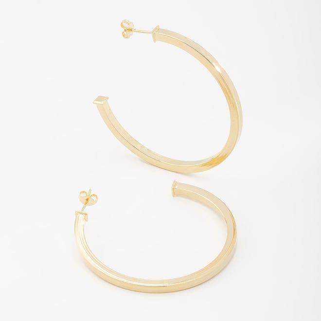 AT-00020 BRINCO BANHADO A OURO 18K EM FORMATO DE ARGOLA LISA