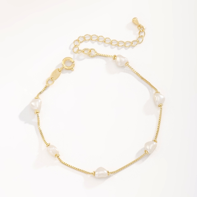 PU-00013 PULSEIRA BANHADA A OURO 18K COM PÉROLAS EM FORMATO DE CORAÇÃO