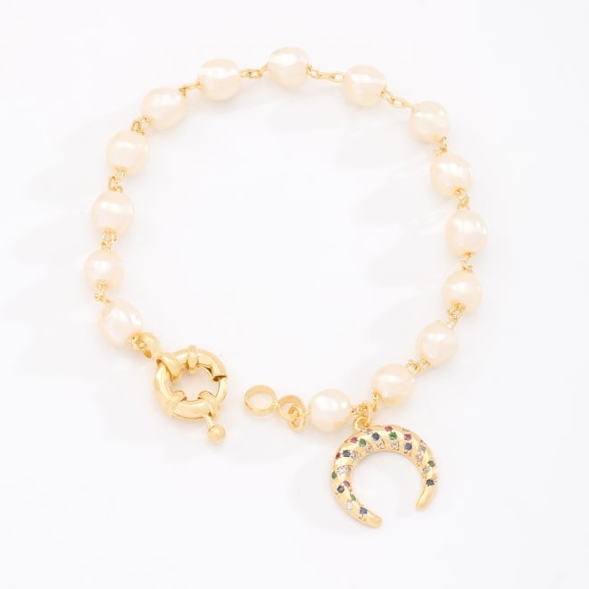 PU-00026 PULSEIRA BANHADA A OURO 18K COM P&Eacute;ROLAS E PINGENTE EM FORMATO DE FERRADURA &nbsp;EM ZIRC&Ocirc;NIAS