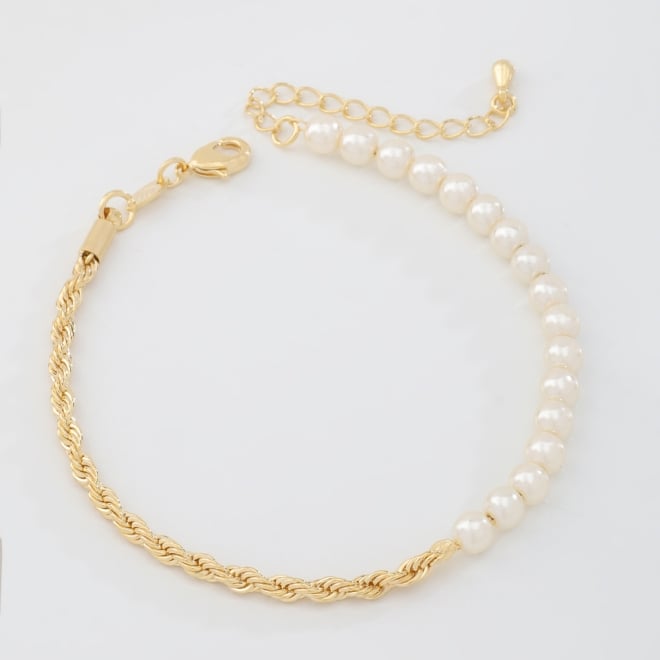 PU-00542 PULSEIRA BANHADA A OURO 18K COM CORRENTE TORCIDA E DETALHES EM P&Eacute;ROLAS