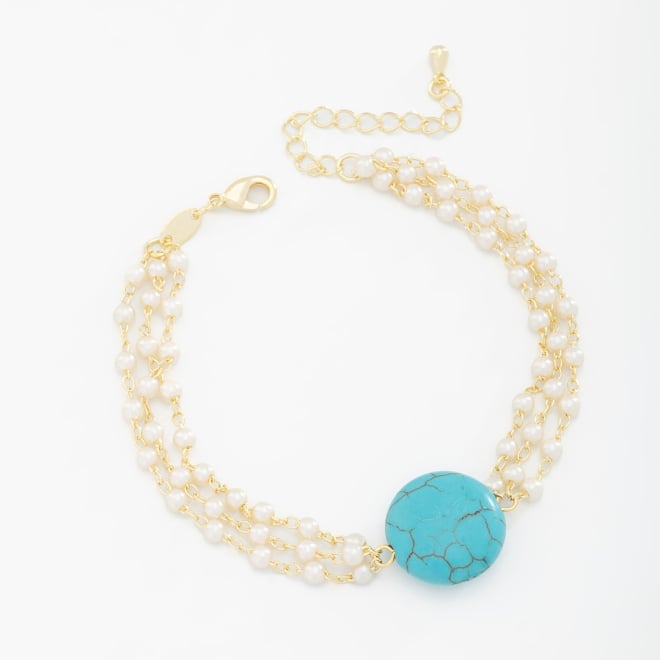 PU-00765 PULSEIRA BANHADA A OURO 18K COM TRIPLA CORRENTE, DETALHES EM P&Eacute;ROLAS E PEDRA CENTRAL TURQUES