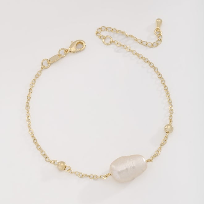 PU-00786 PULSEIRA COM DETALHES EM PÉROLAS E ESFERAS