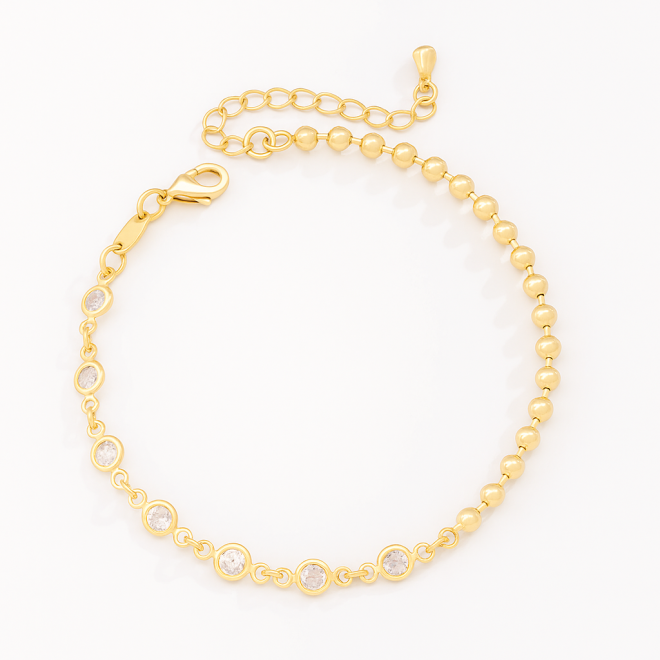 PU-00950 PULSEIRA BANHADA A OURO 18K COM DESIGN ASSIMÉTRICO DE ESFERAS E ZIRCÔNIAS