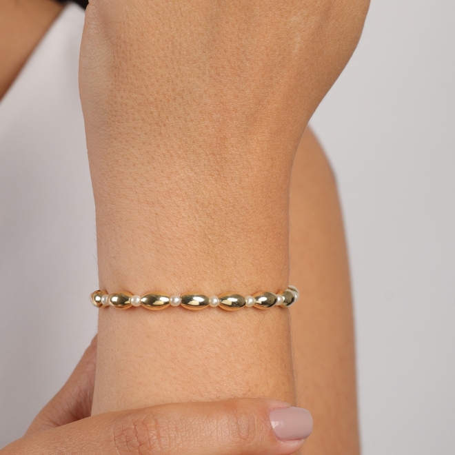 PU-01032 PULSEIRA BANHADA A OURO 18K COM ESFERAS POLIDAS INTERCALADAS EM PÉROLAS