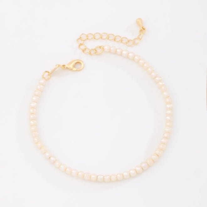 PU-01050 PULSEIRA BANHADA A OURO 18K COM P&Eacute;ROLAS SINT&Eacute;TICAS