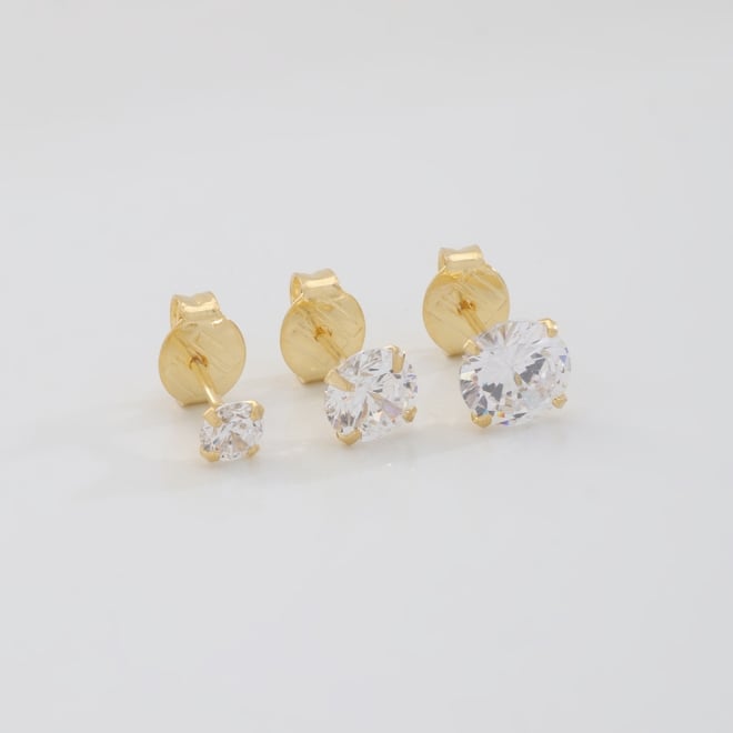 TBF-00006-TRIO DE BRINCOS BANHADOS A OURO 18K COM PEDRAS SOLITÁRIAS EM ZIRCÔNIA