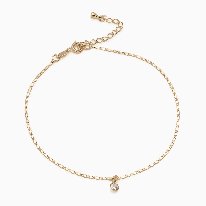 TN-00028 TORNOZELEIRA BANHADA A OURO 18K COM CORRENTE DELICADA E PINGENTE DE ZIRCÔNIA