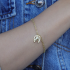 PU-00985-PULSEIRA FERRADURA COM CABEÇA DE CAVALO E ZIRCÔNIAS