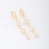 AC-0956 BRINCO ARGOLA CLICK BANHADO A OURO 18K COM PINGENTES EM FORMATO DE GOTA