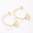 AGL-00240 BRINCO BANHADO A OURO 18K EM FORMATO DE ARGOLA COM PINGENTE EM CORAÇÃO