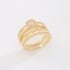 AN-02004 ANEL BANHADO A OURO 18K COM DESIGN TRIPLO CRAVEJADO EM ZIRCÔNIAS
