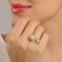 AN-02005 ANEL BANHADO A OURO 18K COM DESIGN ABERTO E DUAS ESFERAS CRAVEJADAS