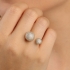 AN-02005 ANEL BANHADO A OURO 18K COM DESIGN ABERTO E DUAS ESFERAS CRAVEJADAS
