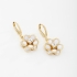 AQ-00007 BRINCO ARGOLA CLICK BANHADO A OURO 18K COM PINGENTE EM FORMATO DE FLOR