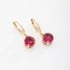AQ-00022 BRINCO BANHADO A OURO 18K EM FORMATO DE ARGOLA COM PINGENTE DE ZIRCÔNIA