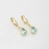 AQ-00034 BRINCO BANHADO A OURO 18K EM FORMATO DE ARGOLA COM PINGENTE DE ZIRCÔNIA EM GOTA