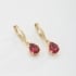 AQ-00034 BRINCO BANHADO A OURO 18K EM FORMATO DE ARGOLA COM PINGENTE DE ZIRCÔNIA EM GOTA