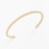 BL-00062 BRACELETE BANHADO A OURO 18K COM DESIGN TORCIDO E FORMATO ABERTO