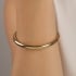 BL-00114 BRACELETE BANHADO A OURO 18K COM DESIGN LISO E ACABAMENTO POLIDO