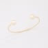 BL-00117 BRACELETE BANHADO A OURO 18K COM PÉROLAS NAS EXTREMIDADES E DESIGN MINIMALISTA