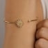BL-00126-BRACELETE ABERTO COM FLOR CRAVEJADA EM ZIRCÔNIAS