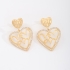 BR-00450 BRINCO BANHADO A OURO 18K COM DESIGN EM CORAÇÕES