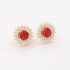 BR-00656-BRINCO FLOR COM ZIRCÔNIAS E PEDRA CENTRAL