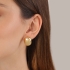 BR-01288 BRINCO BANHADO A OURO 18K COM DESIGN LISO