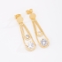 BR-01560 BRINCO BANHADO A OURO 18K COM CORRENTES DELICADAS COM ZIRCÔNIAS