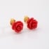 BR-01929 BRINCO BANHADO A OURO 18K COM FLOR EM FORMATO DE ROSA