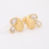 BR-02117 BRINCO BANHADO A OURO 18K COM DESIGN ORGÂNICO E GOTAS EM ZIRCÔNIAS