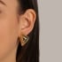BR-02270 -BRINCO BANHADO A OURO 18K GEOMÉTRICO TRIANGULAR