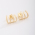 BR-02798-BRINCO BANHADO A OURO 18K COM DESIGN GEOMÉTRICO VAZADO