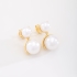BR-02827 BRINCO COM DUPLAS PÉROLAS EM DESIGN ELEGANTE
