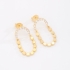 BR-02966 BRINCO BANHADO A OURO 18K COM ARGOLA EM ZIRCÔNIAS E PINGENTE OVAL COM ESFERAS