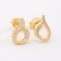 BR-03019 BRINCO BANHADO A OURO 18K COM DESIGN ORGÂNICO ENTRELAÇADO E DETALHES CRAVEJADOS