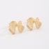 BR-03136 BRINCO BANHADO A OURO 18K DE LAÇO COM DETALHES EM ZIRCÔNIAS