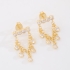 BR-03170-BRINCO BANHADO A OURO 18K COM TOPO EM ZIRCÔNIAS E DETALHES PENDENTES EM CORRENTES COM PONTOS DE LUZ