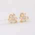 BR-03257 BRINCO FLOR COM ZIRCÔNIAS NAVETE CRISTAL