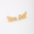 BX-0160 BRINCO BANHADO A OURO 18K DE EAR CUFF COM DESIGN ORGÂNICO EM GOTAS E DETALHES CRAVEJADOS