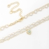 CH-0267 CHOKER COM DETALHES DE PÉROLAS E PINGENTE EM FORMATO DE CORAÇÃO