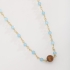 CH-0300 CHOKER COM CONTAS AZUL CLARO E DETALHE CENTRAL EM PEDRA NATURAL