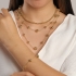 GR-02052 GARGANTILHA BANHADA A OURO 18K COM ESFERAS EM TAMANHOS VARIADOS.