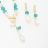 CJ-00278 CONJUNTO COM DETALHES EM TURQUESA E PÉROLAS