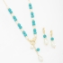 CJ-00278 CONJUNTO COM DETALHES EM TURQUESA E PÉROLAS