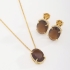 CJS-00020 CONJUNTO BANHADO A OURO 18K COM PEDRAS OVAIS LAPIDADAS.