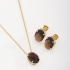 CJS-00020 CONJUNTO BANHADO A OURO 18K COM PEDRAS OVAIS LAPIDADAS.
