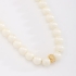 CX-0029 CHOKER BANHADO A OURO 18K COM PÉROLAS SHELL E PINGENTE CRAVEJADO EM ZIRCÔNIAS