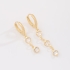 DAC-0040 BRINCO BANHADO A OURO 18K DE ARGOLA DUPLA COM PINGENTES DE CORAÇÃO COM ZIRCÔNIAS
