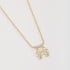GR-01109 COLAR BANHADO A OURO 18K COM DOIS PINGENTES DE MENINO CRAVEJADOS EM ZIRCÔNIAS